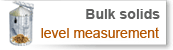 Bulk solids level measurement